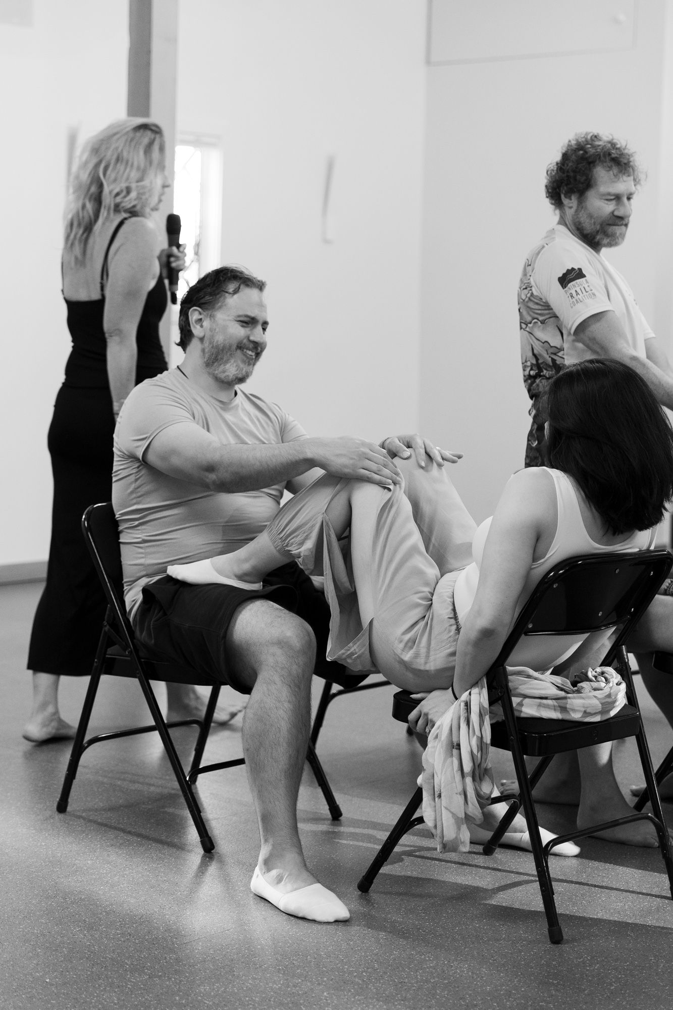 Option B: a pair practicing on chairs.