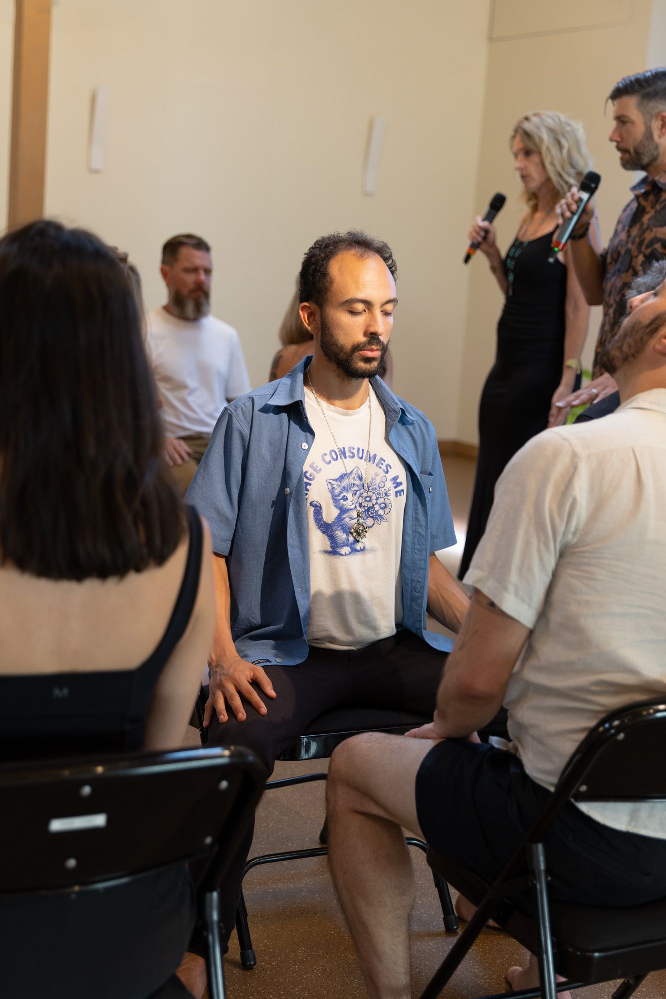 Option A, on the page now: a man seated in guided practice on his own, leaders behind.